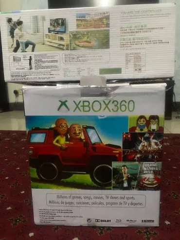xbox 360 with kinect sensor and 2 controllers
