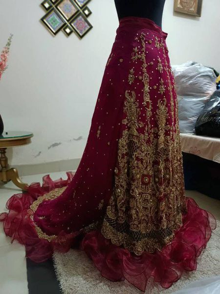 bridal dress tail lehnga with contrast dopata
