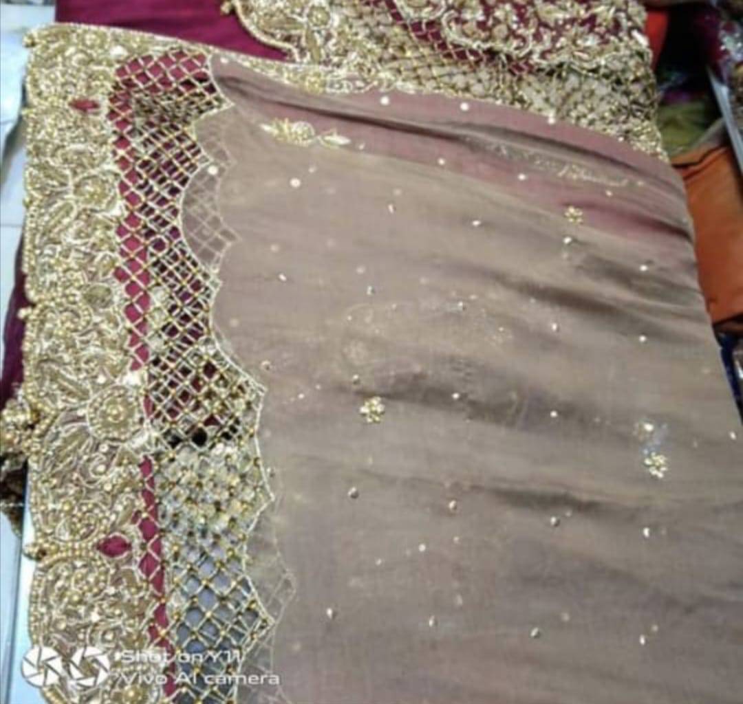 bridal dress tail lehnga with contrast dopata
