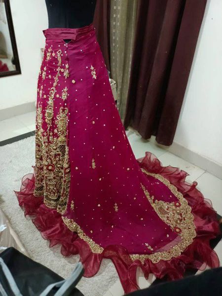 bridal dress tail lehnga with contrast dopata