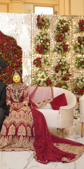 bridal dress with long tailed lehnga